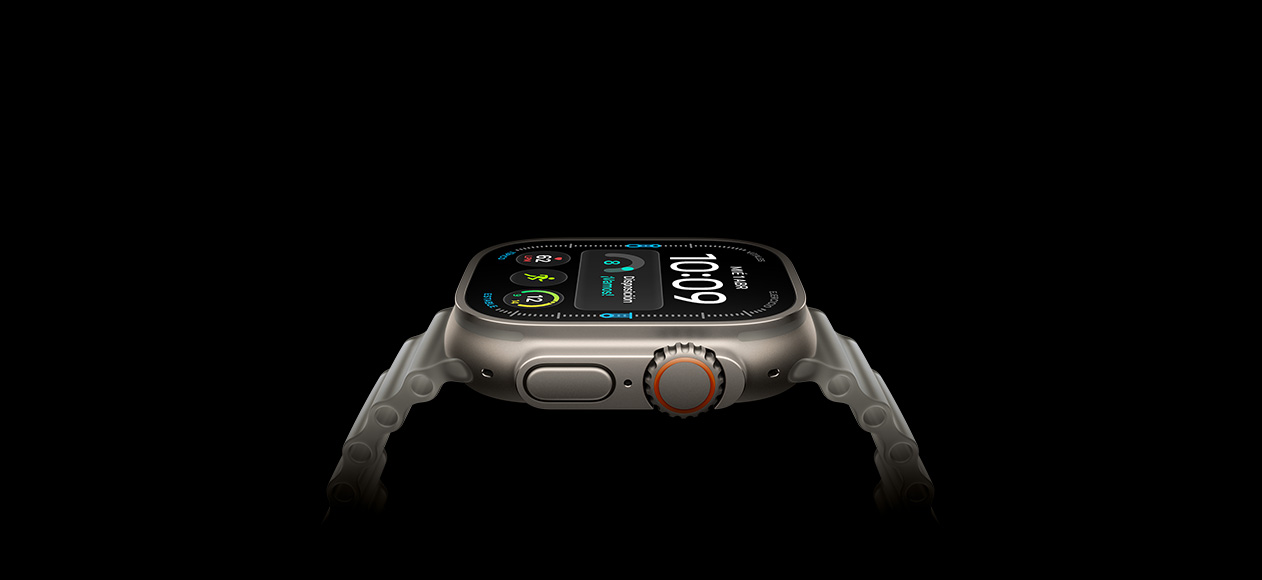Apple Watch Ultra 4, caja de titanio, color natural, parte lateral derecha, Digital Crown, botón lateral en relieve, carátula digital, correa Ocean gris translúcido