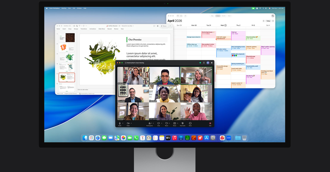 La pantalla de un iMac muestra una videollamada de Zoom con varios participantes, un calendario y una presentación abierta en segundo plano