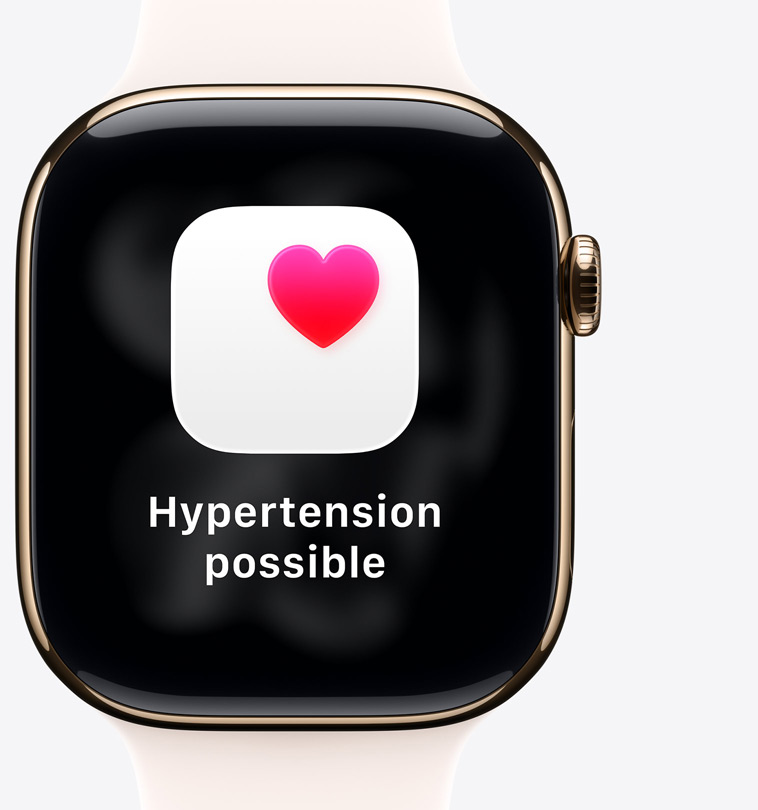 Apple Watch Series 11, boîtier en titane, finition or poli, notification d’hypertension possible, cœur rose dans un carré blanc, côté droit, Digital Crown, Bracelet Sport rose tendre