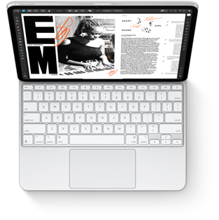 Tampak dari atas iPad Pro dengan Magic Keyboard berwarna putih untuk iPad Pro.