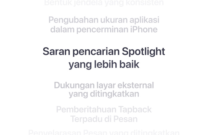 Daftar fitur secara vertikal, dengan “Saran pencarian Spotlight yang lebih baik” ditampilkan tebal di tengah. Fitur-fitur sekitarnya memudar menjadi latar belakang di atas dan di bawah.