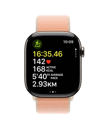 Apple Watch Series 11, Gold, with Workout app on screen showing running metrics including time, heart rate, active calories, average pace, and distance