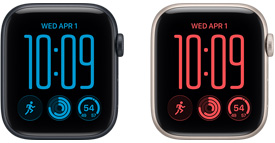 Apple&nbsp;Watch SE&nbsp;3, hliníkové pouzdro, temně inkoustová barva (černá), pohled zepředu, displej od okraje k&nbsp;okraji, korunka Digital Crown, sportovní řemínek, černá barva, magnetická rychlonabíječka Apple Watch s&nbsp;USB‑C kabelem