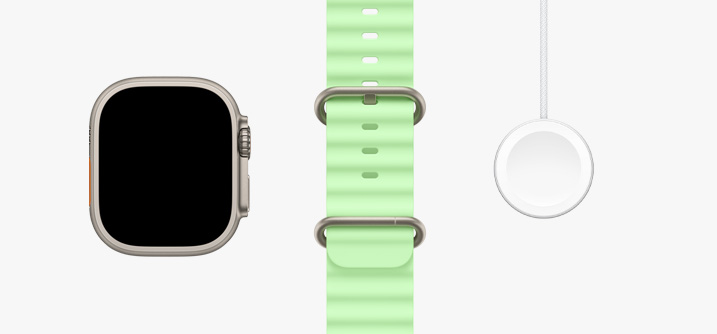 Apple Watch Ultra 3, kuoren värinä luonnontitaani, reunasta reunaan ulottuva näyttö, neonvihreä Ocean-ranneke, Apple Watchin magneettinen pikalaturi–USB-C-johto