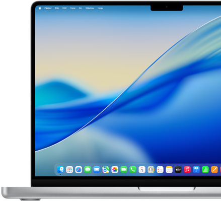 Una MacBook Pro de 14 pulgadas plateada está abierta con el fondo de pantalla macOS Tahoe 26.
