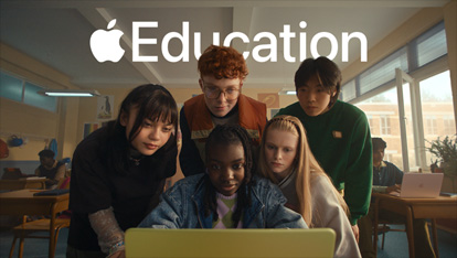 Five students collaborate on MacBook Neo in Citrus, engaged in a dynamic learning experience in the classroom
