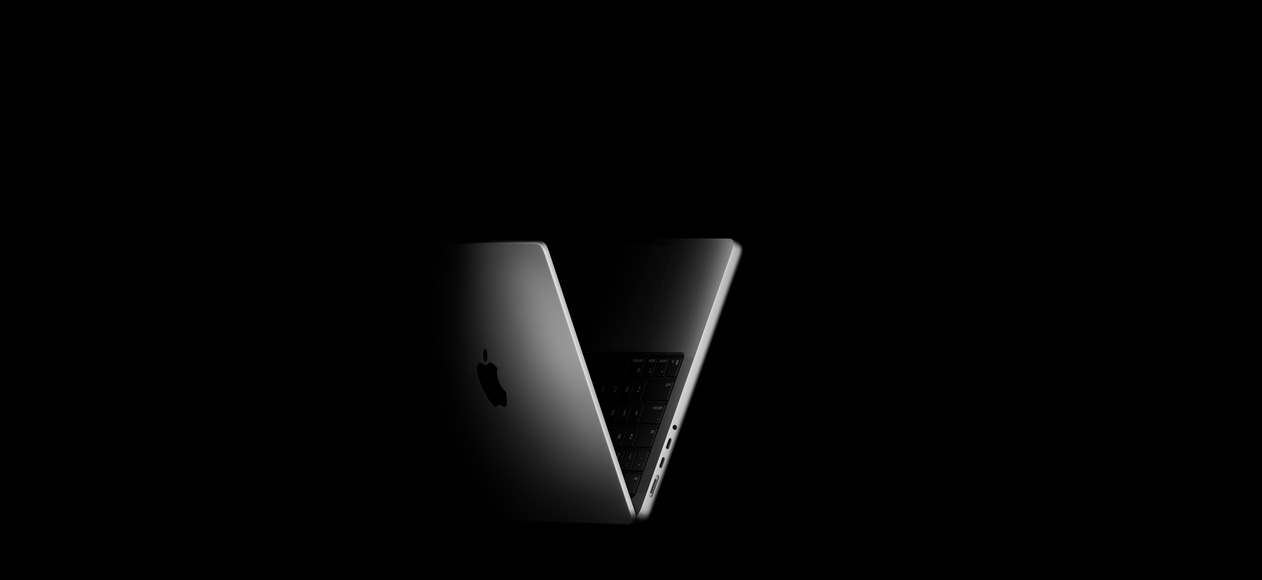 MacBook&nbsp;Pro poziționat în formă de V, făcând referire la familia de cipuri&nbsp;M5