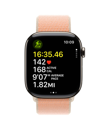 Apple Watch Series 11, Gold, with Workout app on screen showing running metrics including time, heart rate, active calories, average pace, and distance