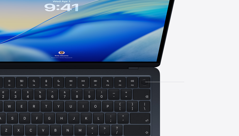 Open MacBook Air demonstrating the location of the Touch ID button